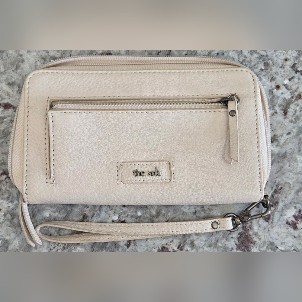 The Sak Cream Leather Wristlet